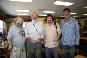 L-R: Jan B. Tucker, Guillermo Suarez, Carlos Callejo, with Black Panther Roland Freeman